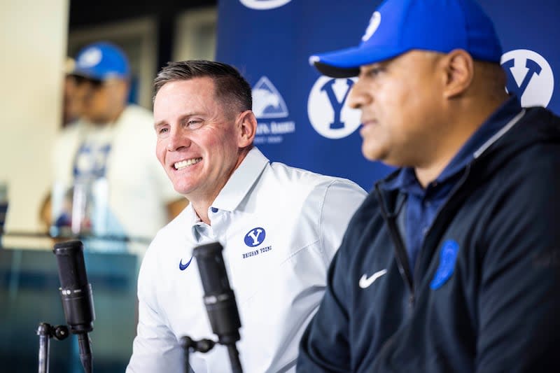 New BYU defensive coordinator Jay Hill, left, meets with the media with head coach Kalani Sitake on Dec. 7, 2022.