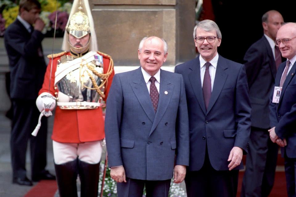 Mikhail Gorbachev is welcomed by John Major (Jim James/PA) (PA Archive)