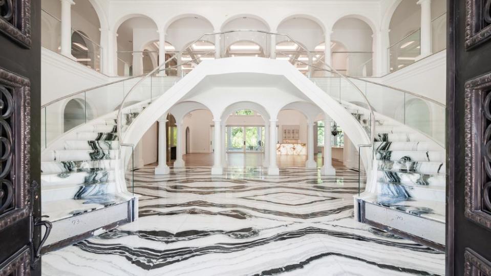 The foyer has been outfitted with black-and-white panda marble. - Credit: Stephen Reed Photography