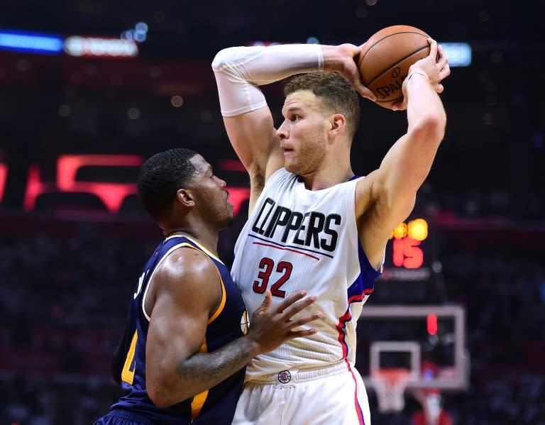 Blake Griffin of the LA Clippers is defended by Joe Johnson of the Utah Jazz during the first half, at Staples Center in Los Angeles, California, on April 15, 2017