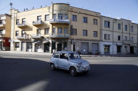 A old Fiat car drives along a street in Eritrea's capital Asmara, February 20, 2016. To match Special Report ERITREA-MINING/NEVSUNÊ REUTERS/Thomas Mukoya/File Photo