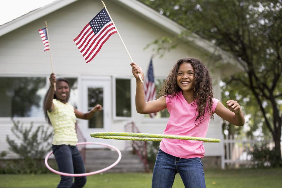 girls hula hooping with american flags 4th of july activities