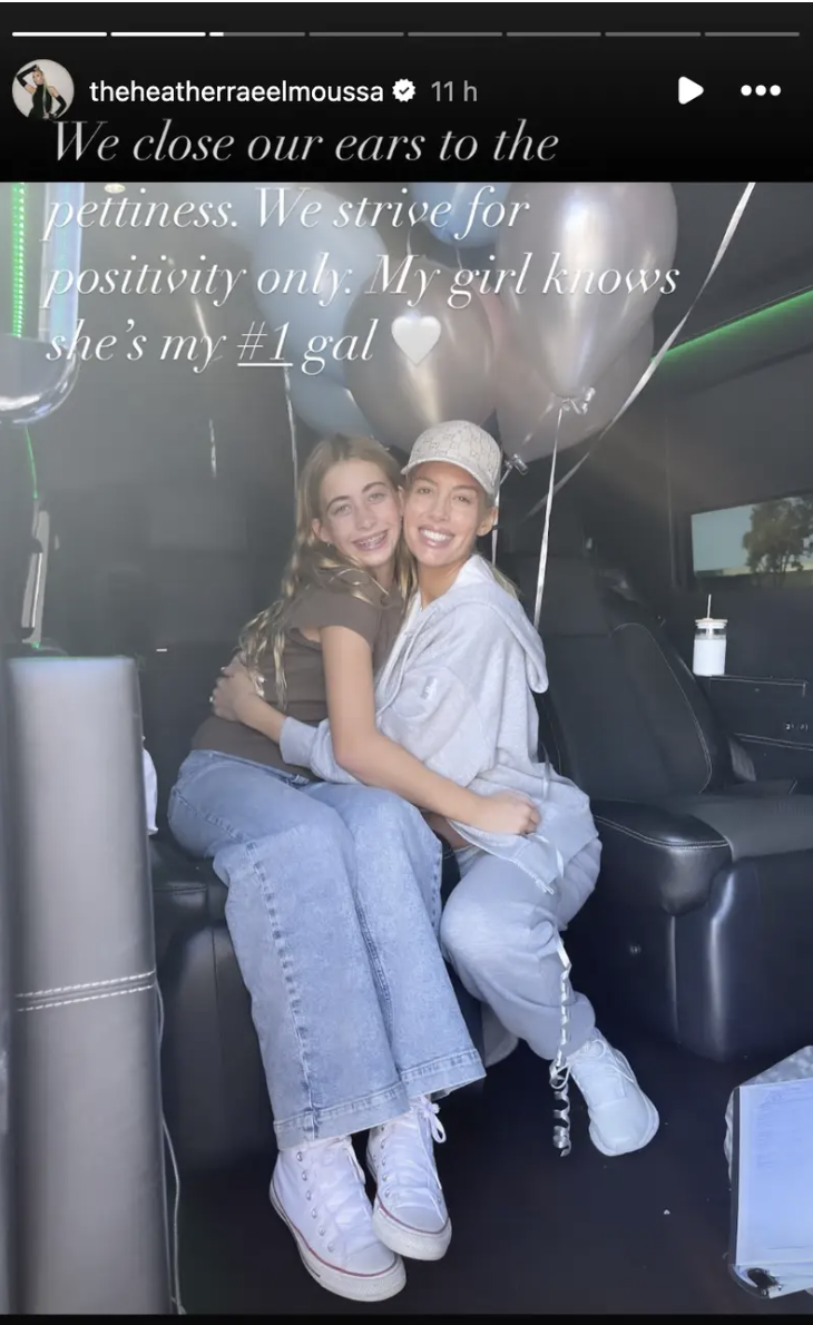 Heather Rae El Moussa and Taylor El Moussa sitting and smiling in a vehicle, holding balloons