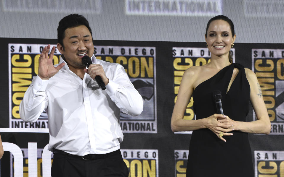 Don Lee, left, and Angelina Jolie participate in the Marvel Studios panel on day three of Comic-Con International on Saturday, July 20, 2019, in San Diego. (Photo by Chris Pizzello/Invision/AP)