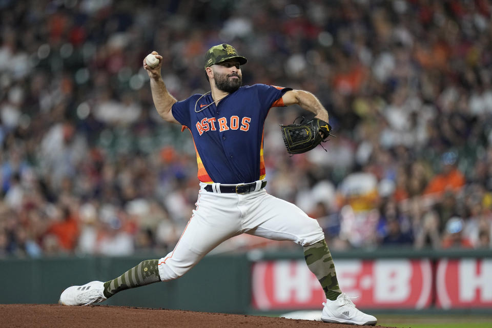 Houston Astros starting pitcher Jose Urquidy throws against the Texas Rangers during the first inning of a baseball game Sunday, May 22, 2022, in Houston. (AP Photo/David J. Phillip)