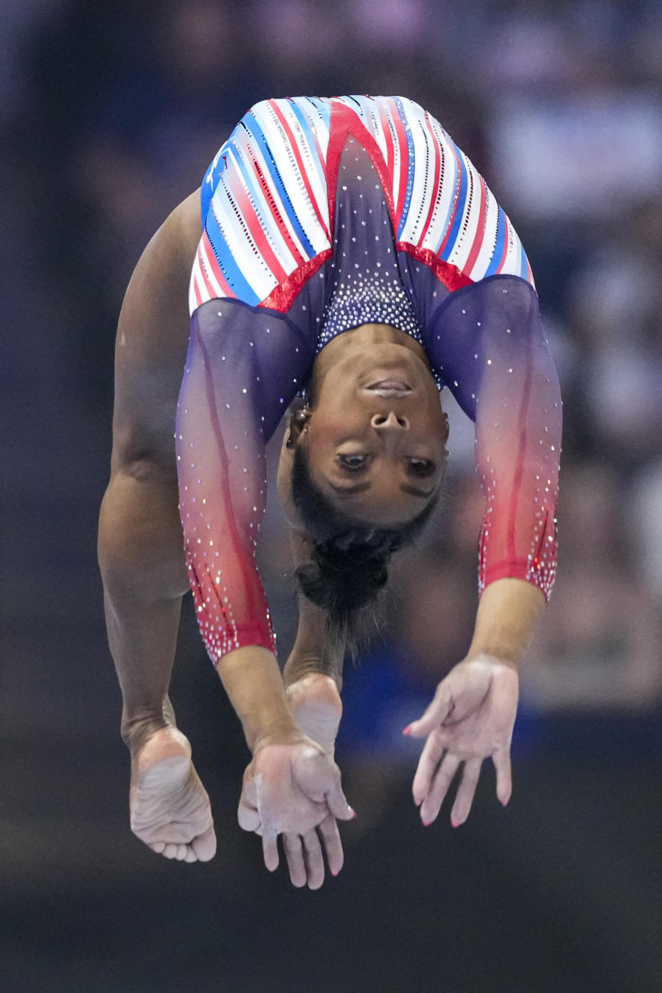 Simone Biles competes on the balance beam at the United States Gymnastics Olympic Trials on Sunday, June 30, 2024, in Minneapolis. (AP Photo/Charlie Riedel)