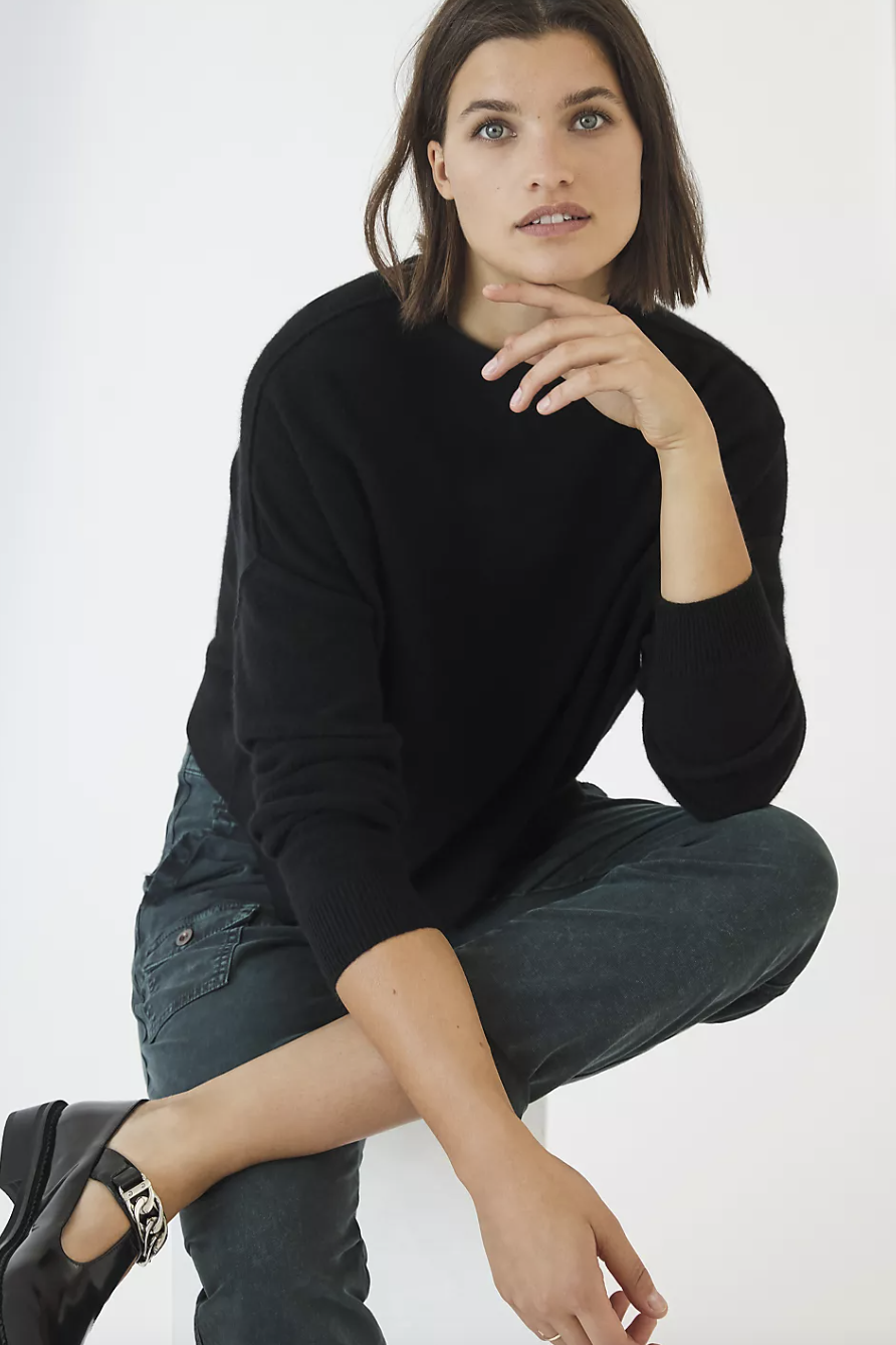 woman in black sweater and black chunky loafers Pilcro Alani Cashmere Mock Neck Sweater (Photo via Anthropologie)