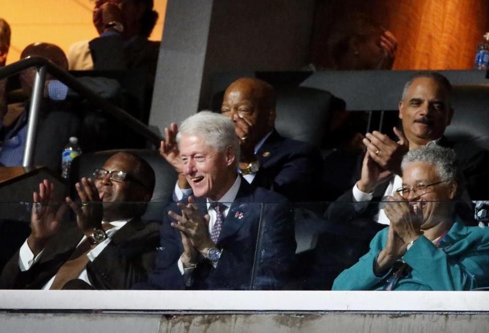 Bill Clinton reacts to Michelle Obama’s speech at the Democratic National Convention. (Photo: Lucy Nicholson/Reuters)