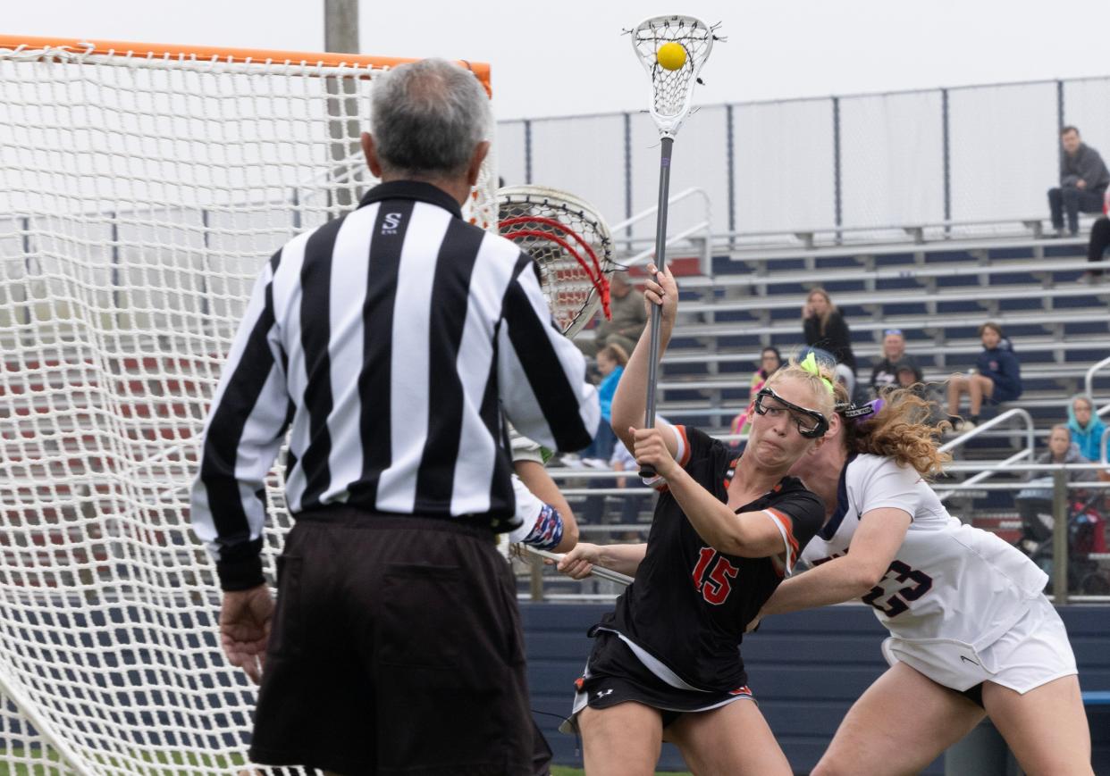 Barnegat’s Alyson Sojak works in towards goal and shoots. Barnegat Girls Lacrosse vs Wall in Wall on April 30, 2024.