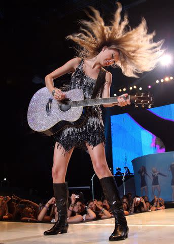 <p>Jason Kempin/Getty</p> Taylor Swift on the Fearless Tour