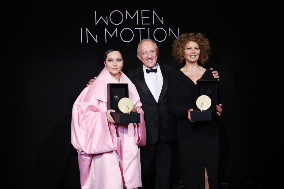 (L-R) Amanda Nell Eu, Francois-Henri Pinault and Donna Langley at the Kering and Cannes Film Festival official dinner