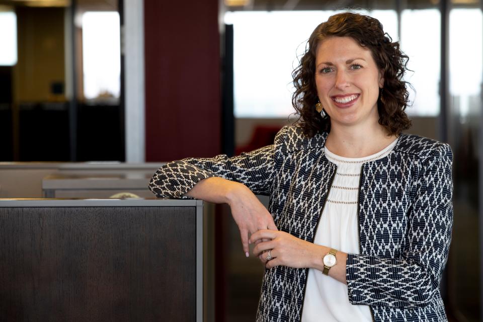 Holly Mazzocca, Bartlett Wealth Management president, stands inside her office in downtown Cincinnati. Mazzocca was awarded one of three Top Workplaces Cincinnati top leader awards.