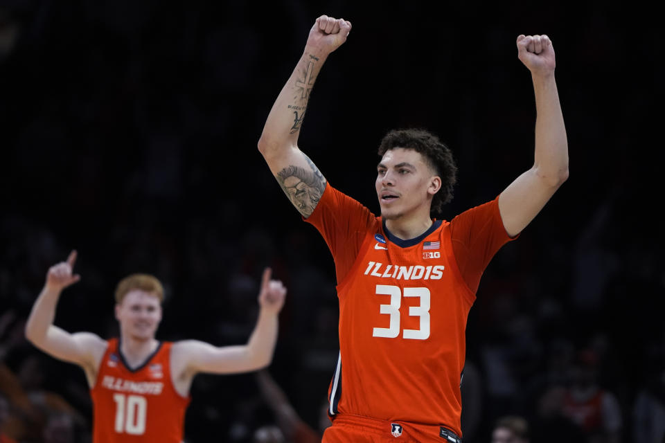 Illinois forward Coleman Hawkins (33) celebrates after defeating Iowa State following a Sweet 16 college basketball game in the men's NCAA Tournament, Friday, March 29, 2024, in Boston. (AP Photo/Michael Dwyer)