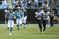 Carolina Panthers running back Christian McCaffrey (22) runs for a touchdown during the second half of an NFL football game against the Jacksonville Jaguars in Charlotte, N.C., Sunday, Oct. 6, 2019. (AP Photo/Mike McCarn)