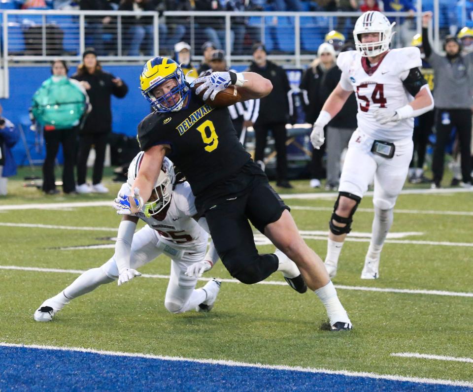 Delaware tight end Braden Brose fights for the end zone and a go-ahead score in the fourth quarter of the Blue Hens' 36-34 comeback win against Lafayette in the opening round of the NCAA FCS playoffs Saturday, Nov. 25, 2023 at Delaware Stadium.