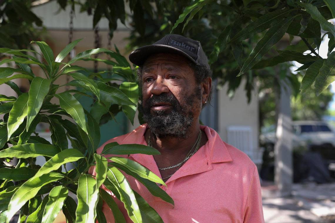 Robert Simpson, a Pahokee resident charged with voter fraud, poses outside of his home on Tuesday, Aug. 30, 2022.