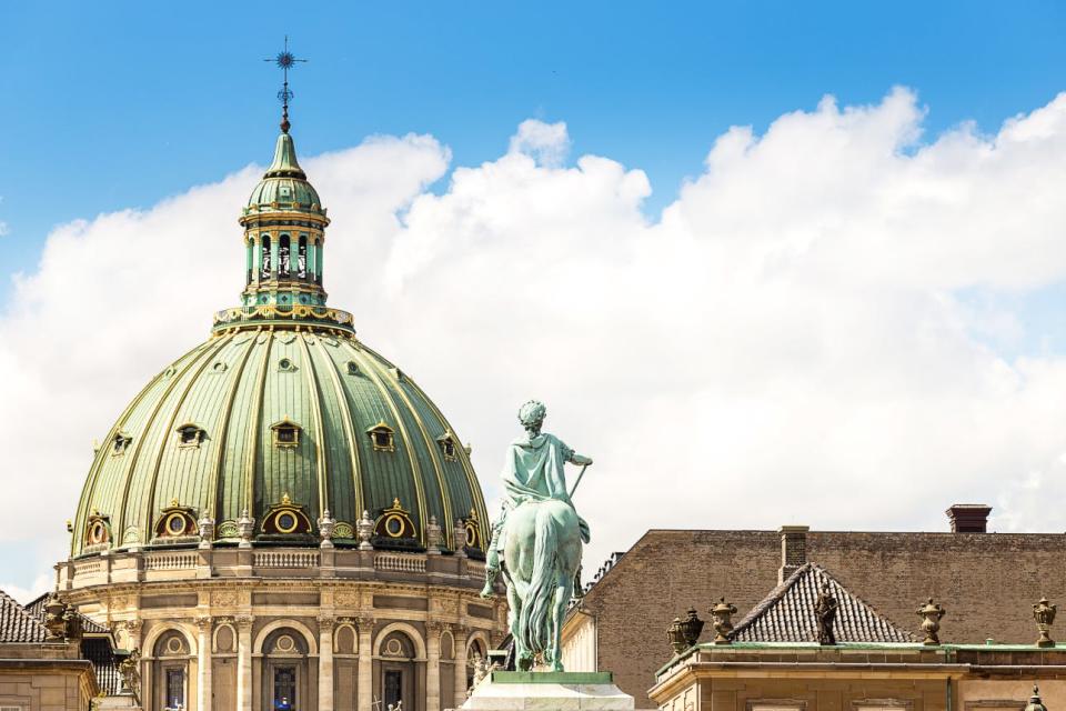 Amalienborg and Frederik's Church rise into the Copenhagen sky