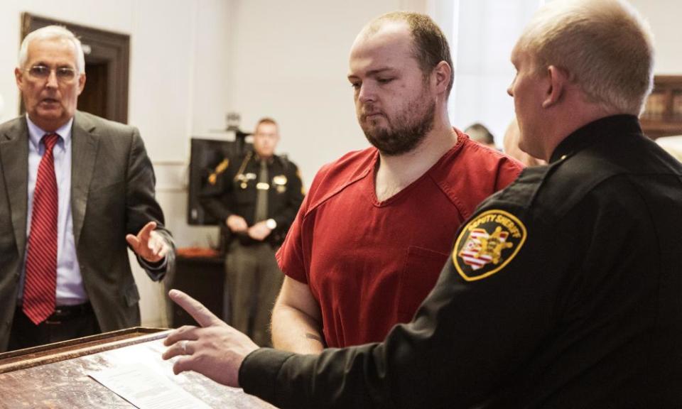 George Wagner IV, center, is escorted out of the courtroom after his arraignment at the Pike county courthouse, in Waverly, Ohio, in November 2018.