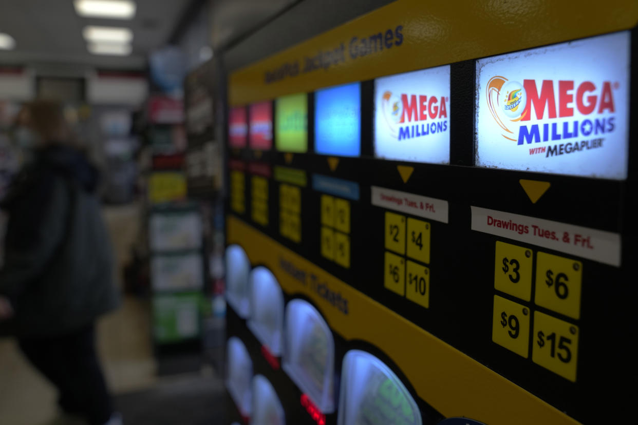 A lottery ticket vending machine is seen at a convenience store Tuesday, Jan. 3, 2023, in Northbrook, Ill. (AP Photo/Nam Y. Huh)