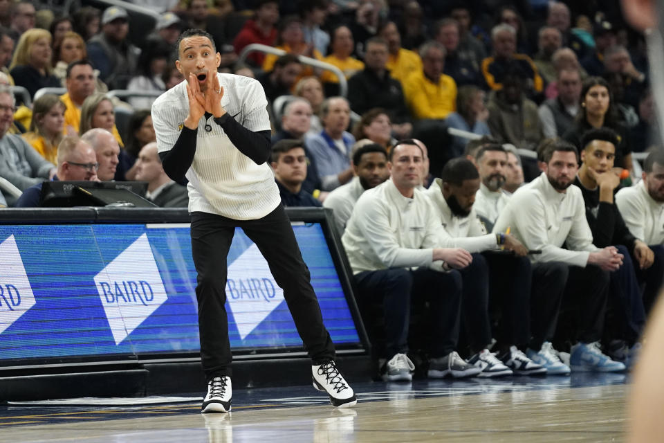 Marquette head coach Shaka Smart shouts from the sideline during the first half of an NCAA college basketball game against Xavier Wednesday, Feb. 15, 2023, in Milwaukee. (AP Photo/Aaron Gash)