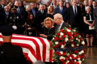 <p>Former Sen. Joe Lieberman and his wife Hadassa kneel at the casket of late Sen. John McCain during ceremonies honoring McCain inside the U.S. Capitol Rotunda in Washington, Aug. 31, 2018. (Photo: Kevin Lamarque/Reuters) </p>