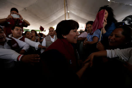 Delfina Gomez of the National Regeneration Movement (MORENA), candidate for the governor greets the audience during her electoral campaign in Metepec, State of Mexico May 16, 2017. Picture taken on May 16, 2017. REUTERS/Carlos Jasso