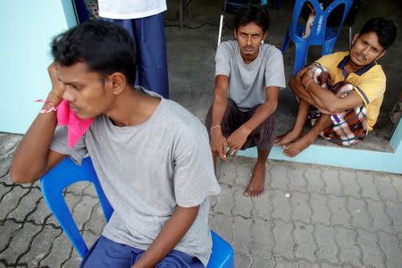 Suspected victims of human trafficking are seen at a government shelter in Takua Pa district of Phang Nga October 17, 2014. REUTERS/Athit Perawongmetha/Files