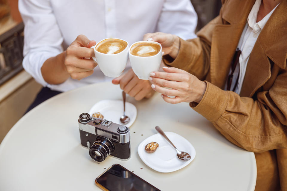 people drinking lattes at a cafe