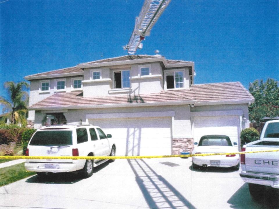 Firefighters were called to the Pettit family home in Modesto, California, at 3 a.m. on August 8, 2013. Neighbors called 911 after seeing fire coming out of an upstairs window.  / Credit: Stanislaus County Superior Court
