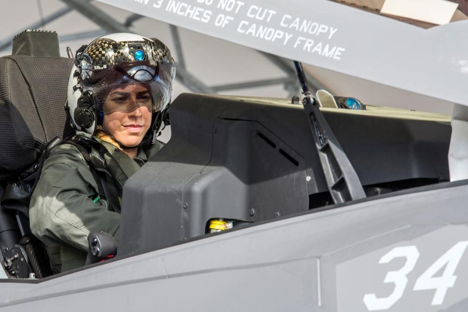 Capt. Anneliese Satz conducts pre-flight checks prior to a training flight.