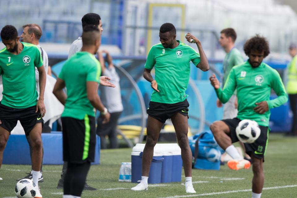 <p>Saudi Arabia’s defender Osama Hawsawi sprays an insect repellent during a training session at the Volgograd Arena in Volgograd on June 24, 2018, on the eve of the Russia 2018 World Cup Group A football match between Saudi Arabia and Egypt. (Photo by NICOLAS ASFOURI / AFP) </p>