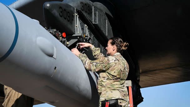 PHOTO: FILE - U.S. Air Force Master Sgt. Marcella Philips, 2nd Maintenance Group weapons standardization loading standardization crew chief, tightens bolts to secure the weapon to a B-52H Stratofortress, at Barksdale Air Force Base Louisiana, Nov. 2, 2022 (Airman Nicole Ledbetter/2nd Bomb Wing Public Affairs, FILE)