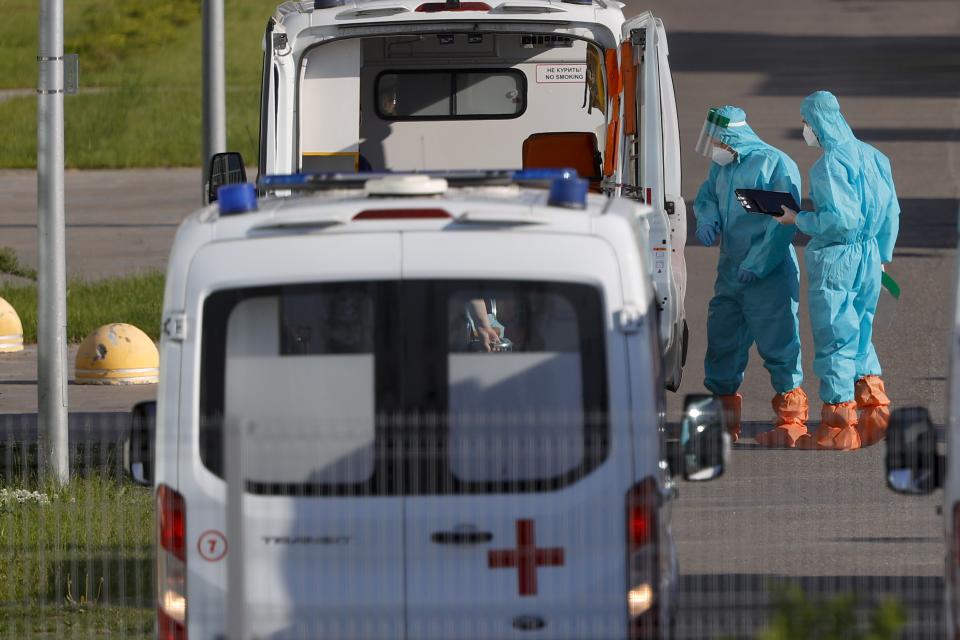 Healthcare professionals, wearing special protective clothing, continue working to combat coronavirus in the capital Moscow (Anadolu Agency via Getty Images)