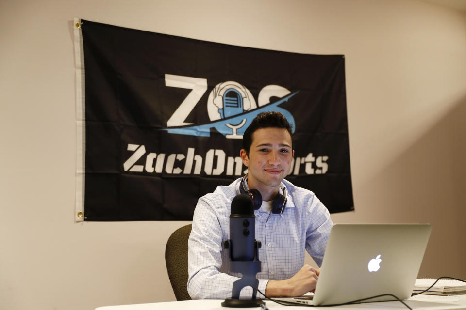 Zach Gershman, a Penn State sophomore, poses for a photograph in his basement studio, Thursday, Aug. 6, 2020, in Philadelphia. Gershman lost a paid summer internship covering The Northwoods collegiate baseball league for local Fox Sports affiliates in the Midwest. (AP Photo/Matt Slocum)