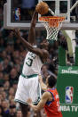 BOSTON, MA - MAY 12: Brandon Bass #30 of the Boston Celtics takes a shot as Evan Turner #12 of the Philadelphia 76ers defends in Game One of the Western Conference Semifinals in the 2012 NBA Playoffs on May 12, 2012 at TD Garden in Boston, Massachusetts. The Boston Celtics defeated the Philadelphia 76ers 92-91. NOTE TO USER: User expressly acknowledges and agrees that, by downloading and or using this photograph, User is consenting to the terms and conditions of the Getty Images License Agreement. (Photo by Elsa/Getty Images)