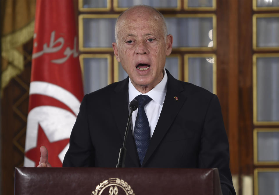 FILE - Tunisian President Kais Saied gives a speech at the new government's swearing-in ceremony at the Carthage Palace outside the capital Tunis, on Feb. 27, 2020. Tunisian officials detained a former prime minister for questioning before freeing him hours later, but jailed two top officials of the moderate Islamist Ennahdha party who’s leader Rached Ghannouchi has been in prison since mid-April, the official TAP news agency said Wednesday. (Fethi Belaid/Pool via AP, File)