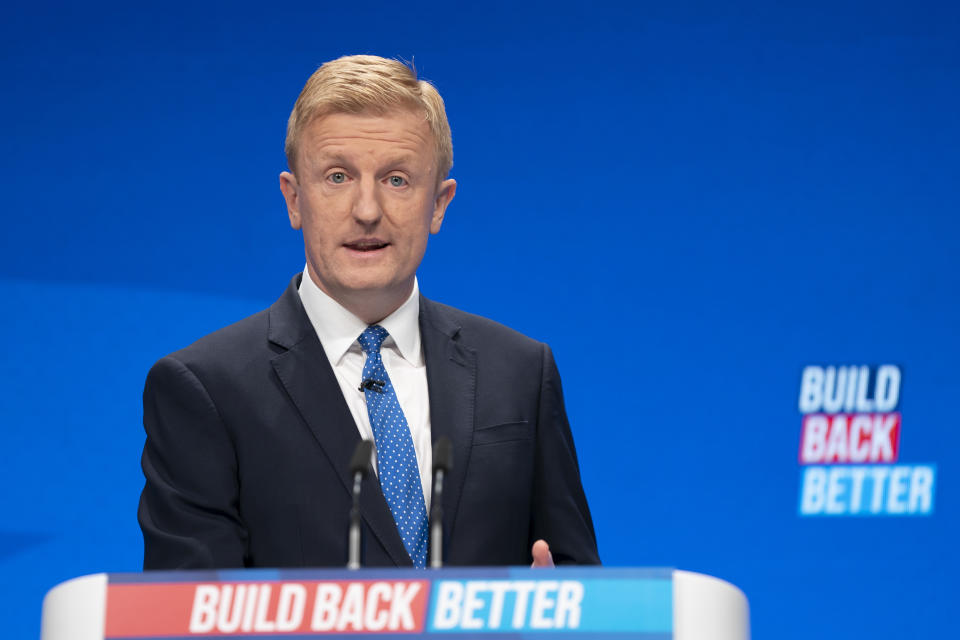 FILE - Conservative Party Chairman Oliver Dowden speaks at the Conservative Party Conference in Manchester, England, Sunday, Oct. 3, 2021. Party chairman Oliver Dowden quit Friday June 24, 2022 in the wake of two special election defeats for British Prime Minister Boris Johnson's Conservative party. (AP Photo/Jon Super, File)