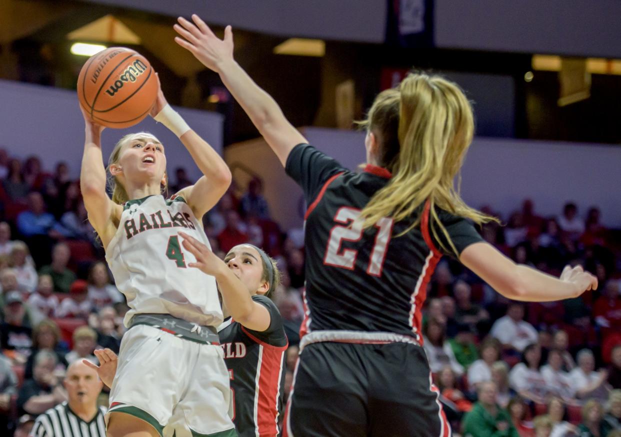 Lincoln's Becca Heitzig (5) shoots over the Deerfield defense in the second half of the Class 3A state semifinals Friday, March 3, 2023 at CEFCU Arena in Normal. The Railers advanced to the title game with a 76-56 win over the Warriors.