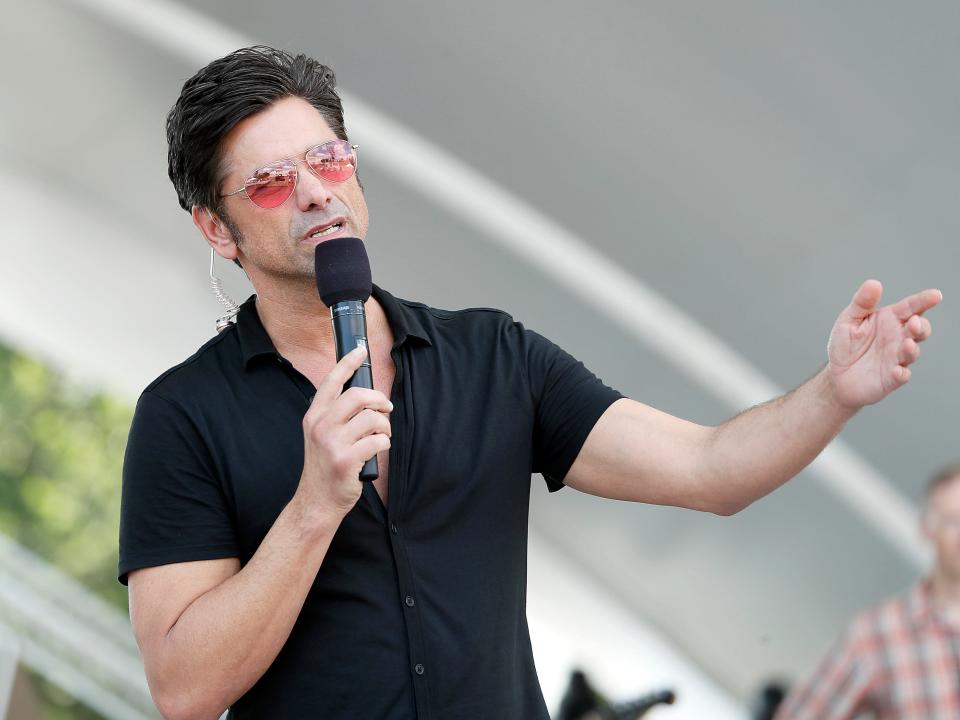 WASHINGTON, DC - JULY 03: Actor and host John Stamos on stage during A Capitol Fourth rehearsals on the West Lawn of the U.S. Capitol Building on July 03, 2019 in Washington, DC. (Photo by Paul Morigi/Getty Images for Capital Concerts, Inc.)