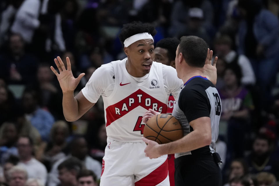 Toronto Raptors forward Scottie Barnes (4) reacts after being called for a foul in the first half of an NBA basketball game against the New Orleans Pelicans in New Orleans, Monday, Feb. 5, 2024. (AP Photo/Gerald Herbert)