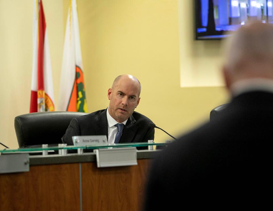 Council member Michael Drahos questions Doug McMahon, CEO of Wellington Lifestyle Partners, during a Village of Wellington Council meeting on Tuesday, Nov. 14, 2023, to address plans to build in the equestrian preserve.