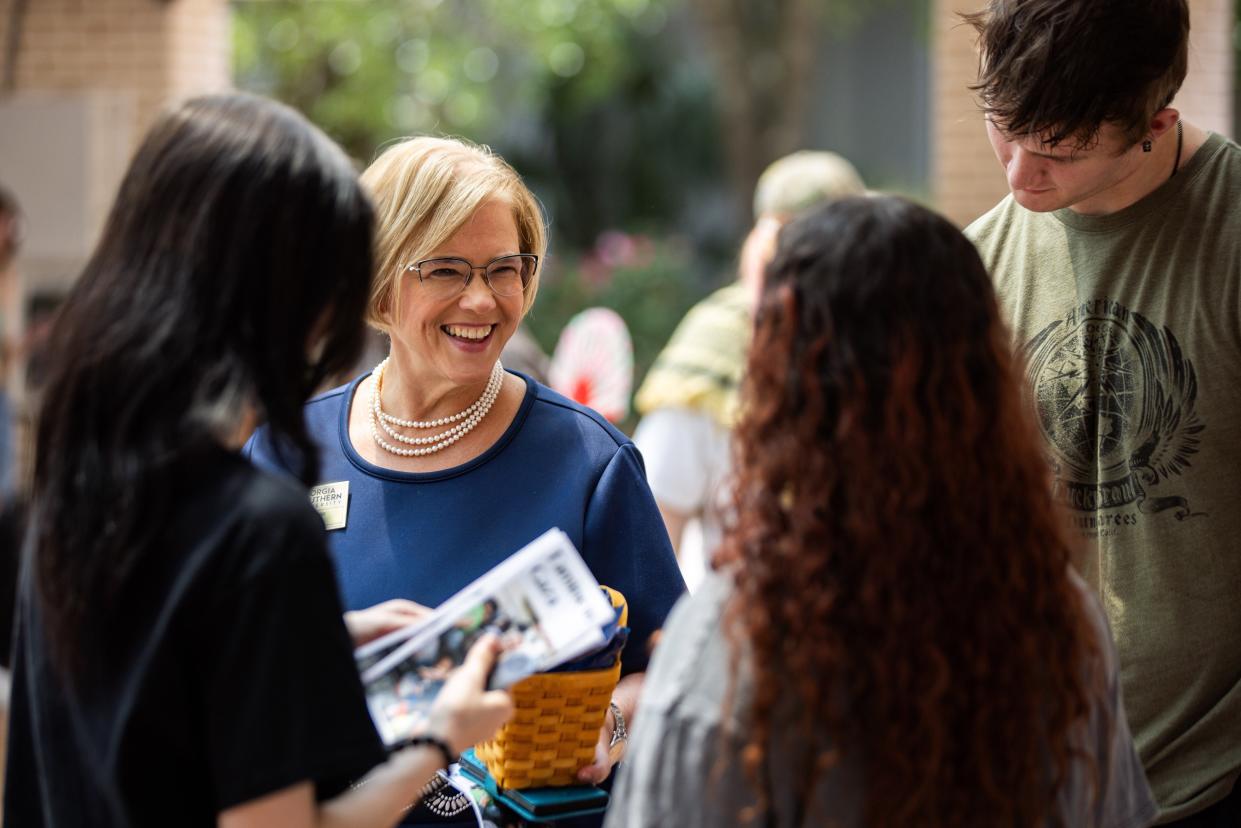 Georgia Southern Vice President of Student affairs Dr. Shay Little, hands out candies to the students protesting the ongoing Israel-Hamas war.