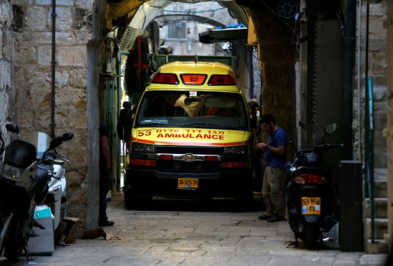 An Israeli ambulance is seen at the site of a stabbing attack by a Palestinian assailant, who was shot dead, in Jerusalem's Old City on March 18, 2018