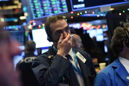 A trader looks on while waiting for the initial price of Tencent Music Entertainment company's IPO on the floor of the New York Stock Exchange (NYSE) in New York, U.S., December 12, 2018. REUTERS/Bryan R Smith