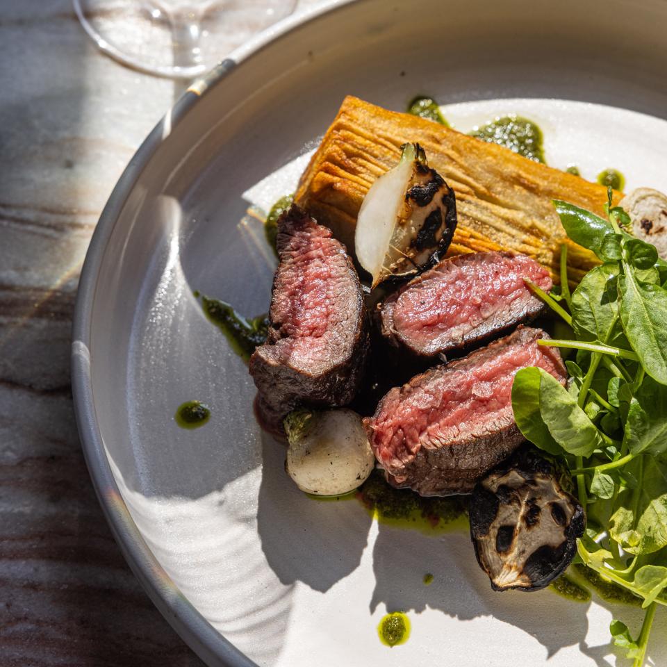 Waygu Beef Loin, with potatas bravas and watercress served at Paseo restaurant in Louisville.