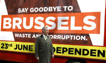 FILE- In this Thursday, March 31, 2016 file photo, Nigel Farage, leader of Britain's UKIP party walks past a 'Grassroots Out' advertising lorry outside the Electoral Commission, in London. Five years ago, Britons voted in a referendum that was meant to bring certainty to the U.K.’s fraught relationship with its European neigbors. Voters’ decision on June 23, 2016 was narrow but clear: By 52 percent to 48 percent, they chose to leave the European Union. It took over four years to actually make the break. The former partners are still bickering, like many divorced couples, over money and trust.(AP Photo/Kirsty Wigglesworth, File)