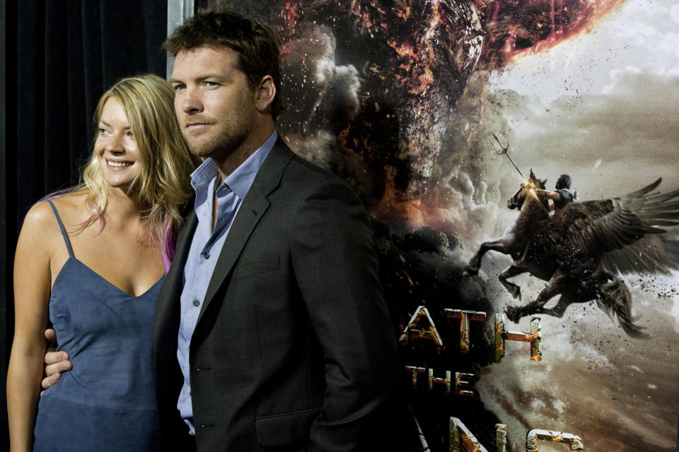 Actor Sam Worthington and his girlfriend Crystal Humphries attend the world premiere of "Wrath of the Titans" in New York, Monday, March 26, 2012. (AP Photo/Charles Sykes)