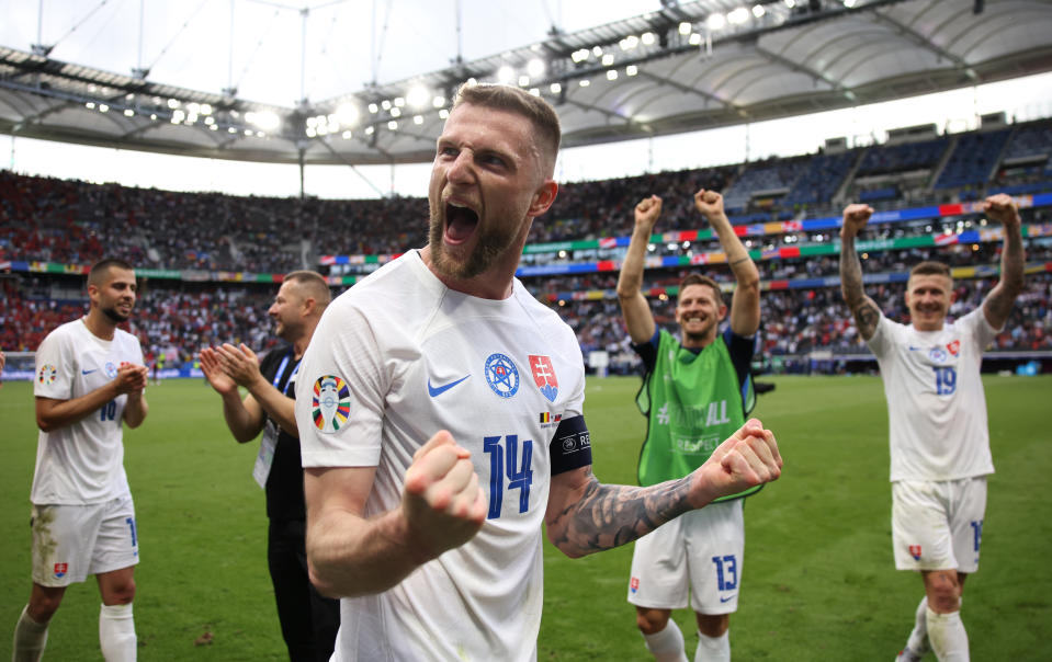 Milan Škriniar celebrates Slovakia's victory. (Ryan Pierse/UEFA via Getty Images)