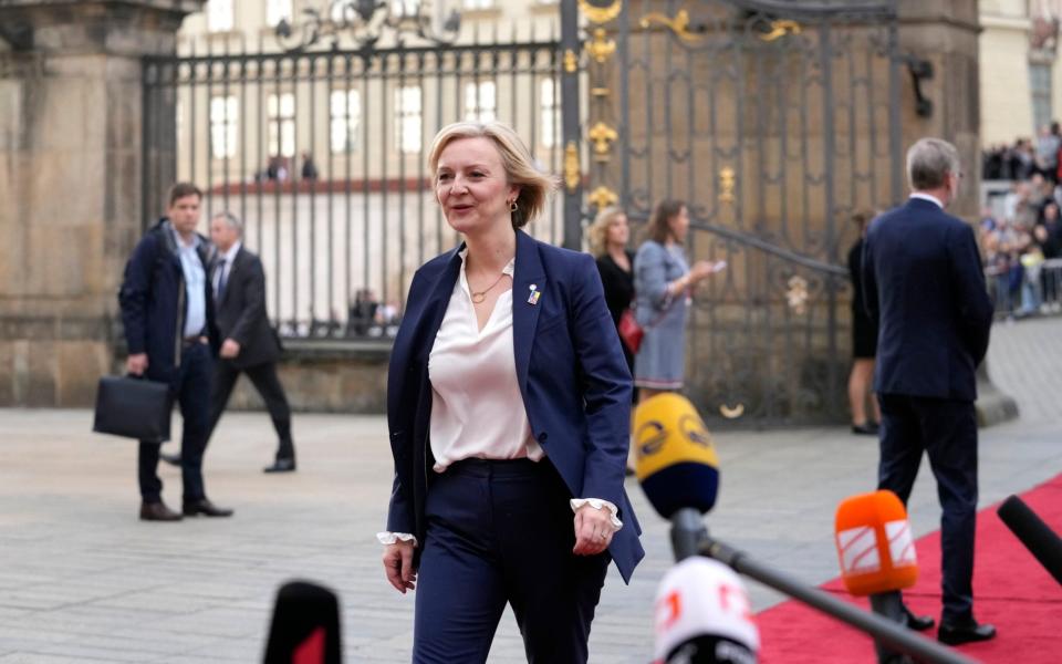 Liz Truss, the Prime Minister, arrives at Prague Castle for a meeting of the European Political Community today - Darko Bandic/AP