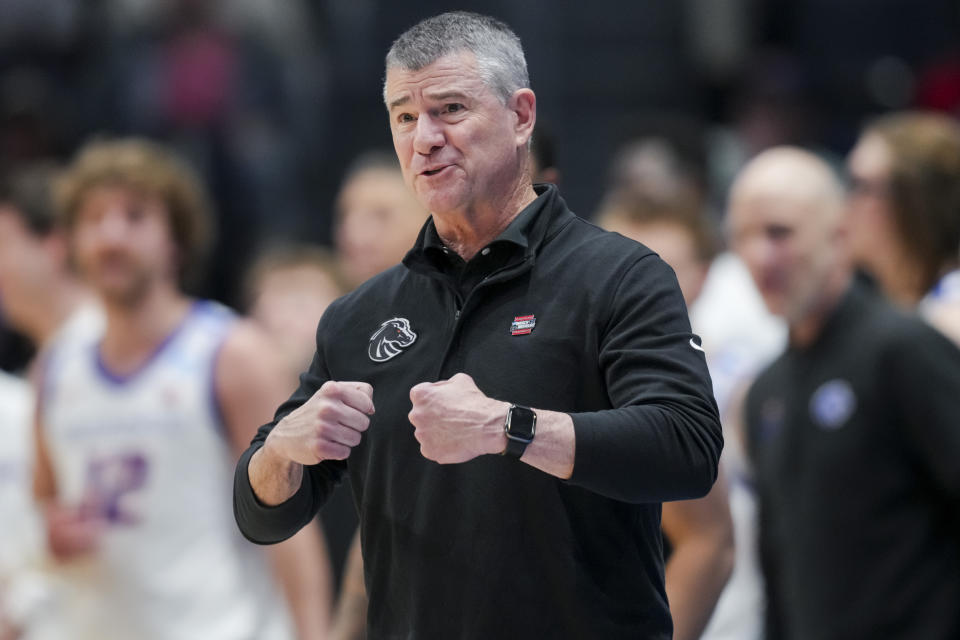 Boise State coach Leon Rice gestures during the second half of the team's First Four game against Colorado in the NCAA men's college basketball tournament Wednesday, March 20, 2024, in Dayton, Ohio. (AP Photo/Aaron Doster)